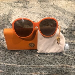 Tory Burch sunglasses.